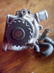 Водяна помпа насос Mazda